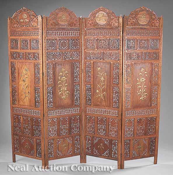 Appraisal: An Anglo-Indian Carved Rosewood and Brass Four Panel Folding Screen