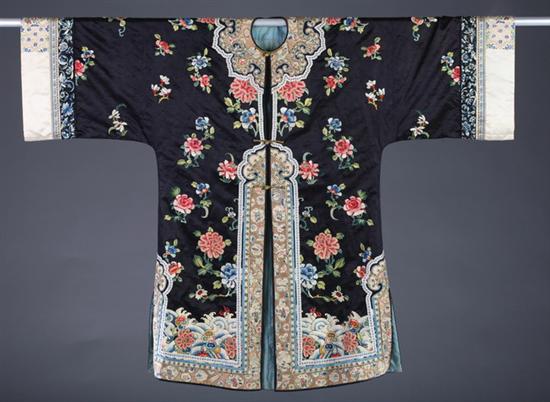 Appraisal: CHINESE EMBROIDERED BLACK SILK COAT Worked with Peking and satin