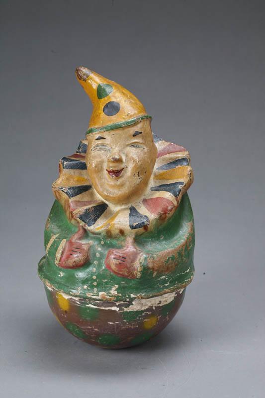 Appraisal: COMPOSITION CLOWN ROLY POLY Plaster with green red yellow and