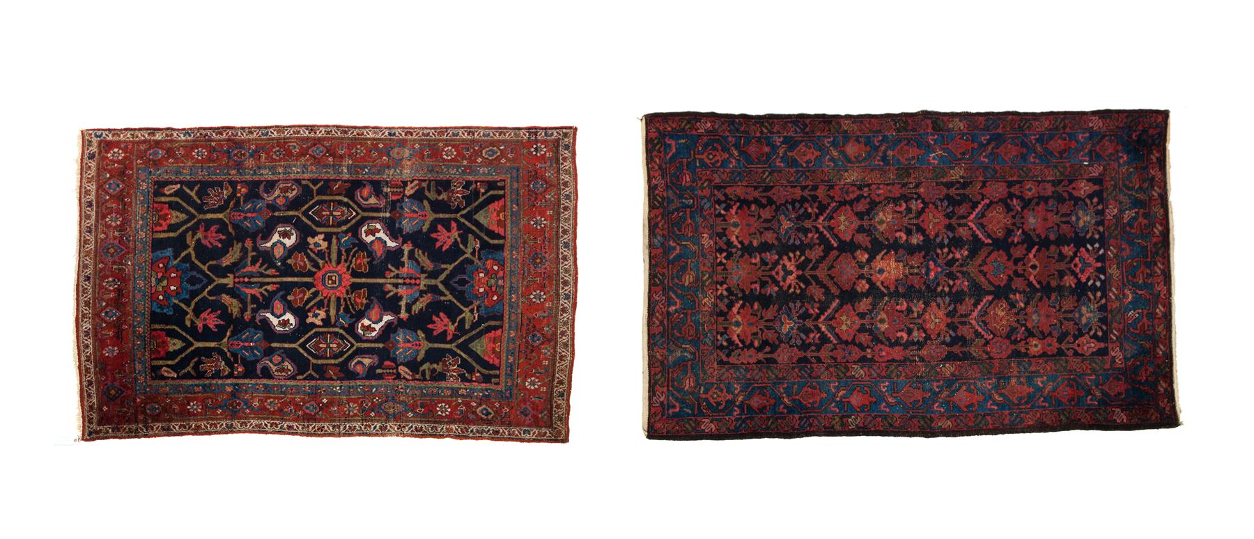 Appraisal: TWO HANDMADE ORIENTAL AREA RUGS Twentieth century Geometric in dark