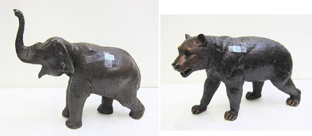 Appraisal: TWO BRONZE WILDLIFE SCULPTURES bear L and elephant L