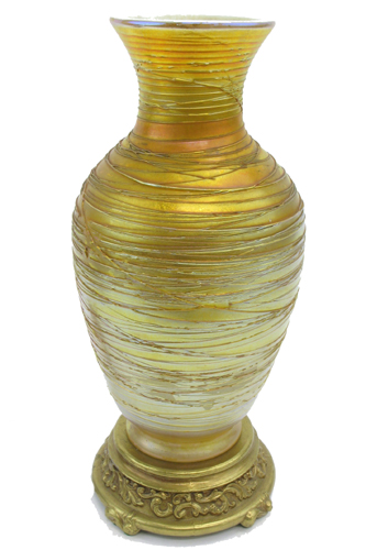 Appraisal: DURAND ART GLASS LAMP The gold iridescent shade having outer