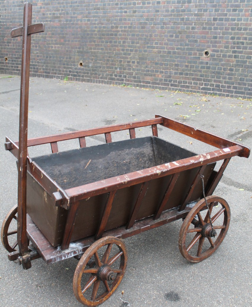 Appraisal: A thC rustic hardwood hay cart or bogie the top