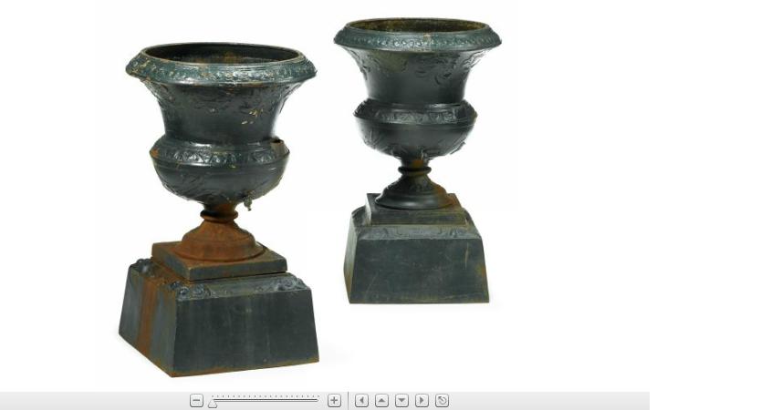 Appraisal: Pair of Victorian green painted cast iron garden urns and