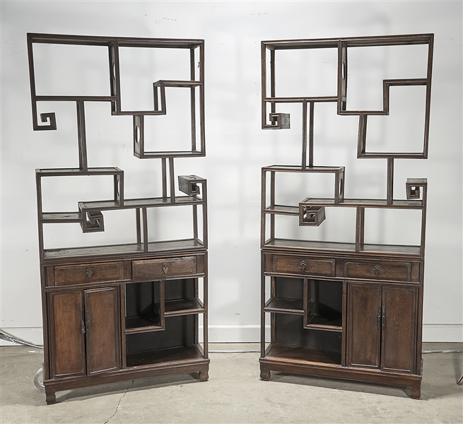 Appraisal: Pair of Chinese curio shelf cabinets each of two parts