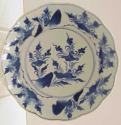 Appraisal: Japanese blue and white charger th C shaped rim floral