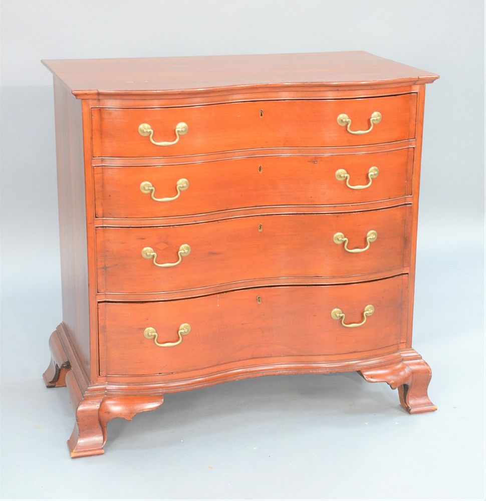 Appraisal: Chippendale Cherry Reverse Serpentine Chest having serpentine below molded edge