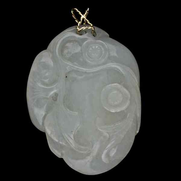 Appraisal: Carved White Nephrite Jade Pendant White nephrite jade pendant with