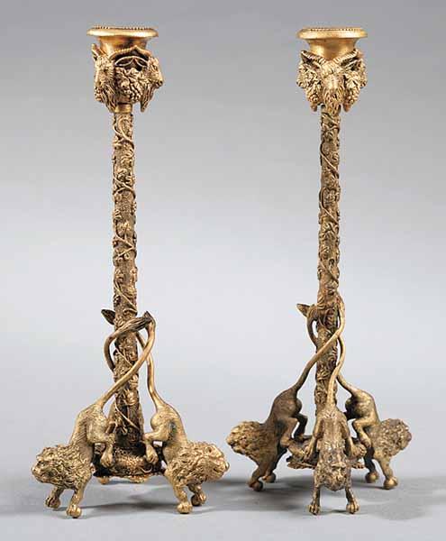 Appraisal: A Pair of Patinated Bronze Candlesticks in the Classical Taste