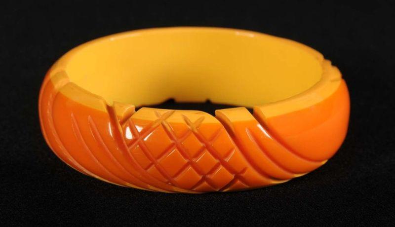 Appraisal: Bakelite Orange Cream Carved Bracelet Description Laminated Condition Excellent Size