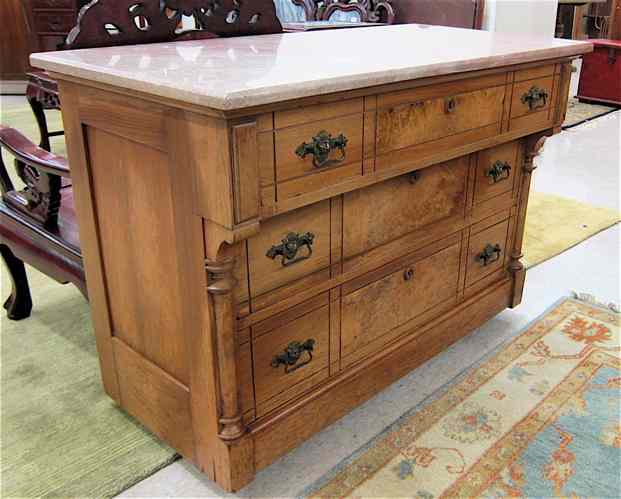 Appraisal: VICTORIAN LOW CHEST OF DRAWERS Eastlake design last quarter of