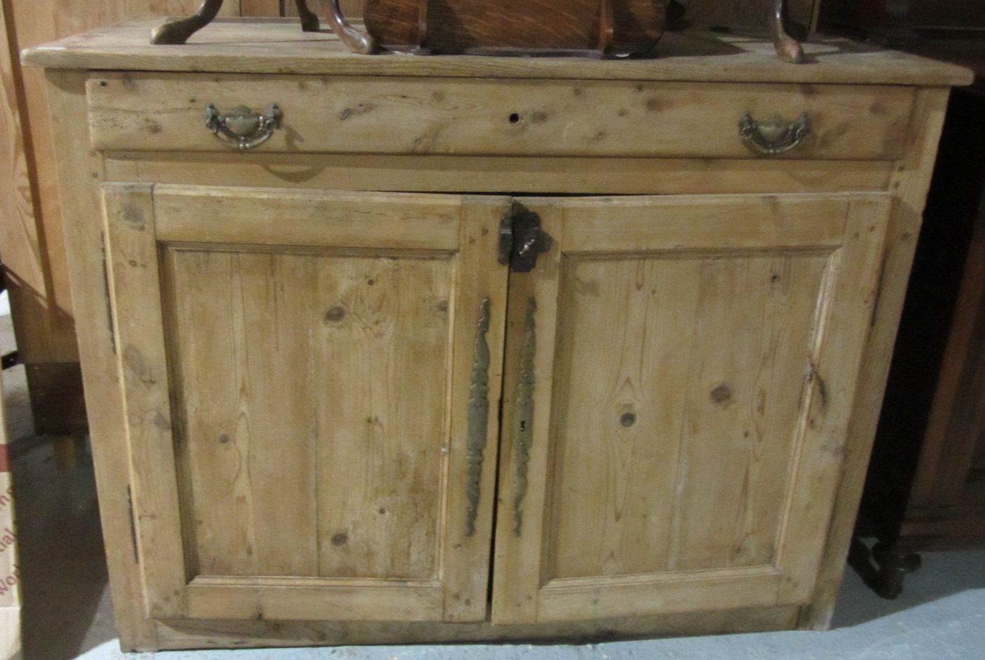 Appraisal: A th century pine buffet with two long drawers and