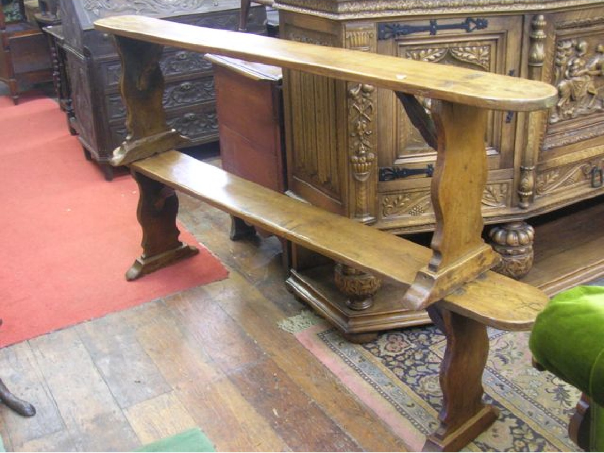 Appraisal: A pair of early th century fruitwood benches the simple