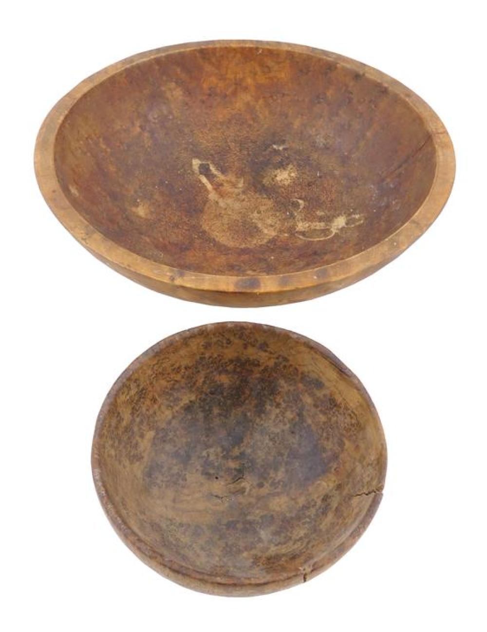 Appraisal: Two early treenware bowls including larger birds-eye maple bowl slightly