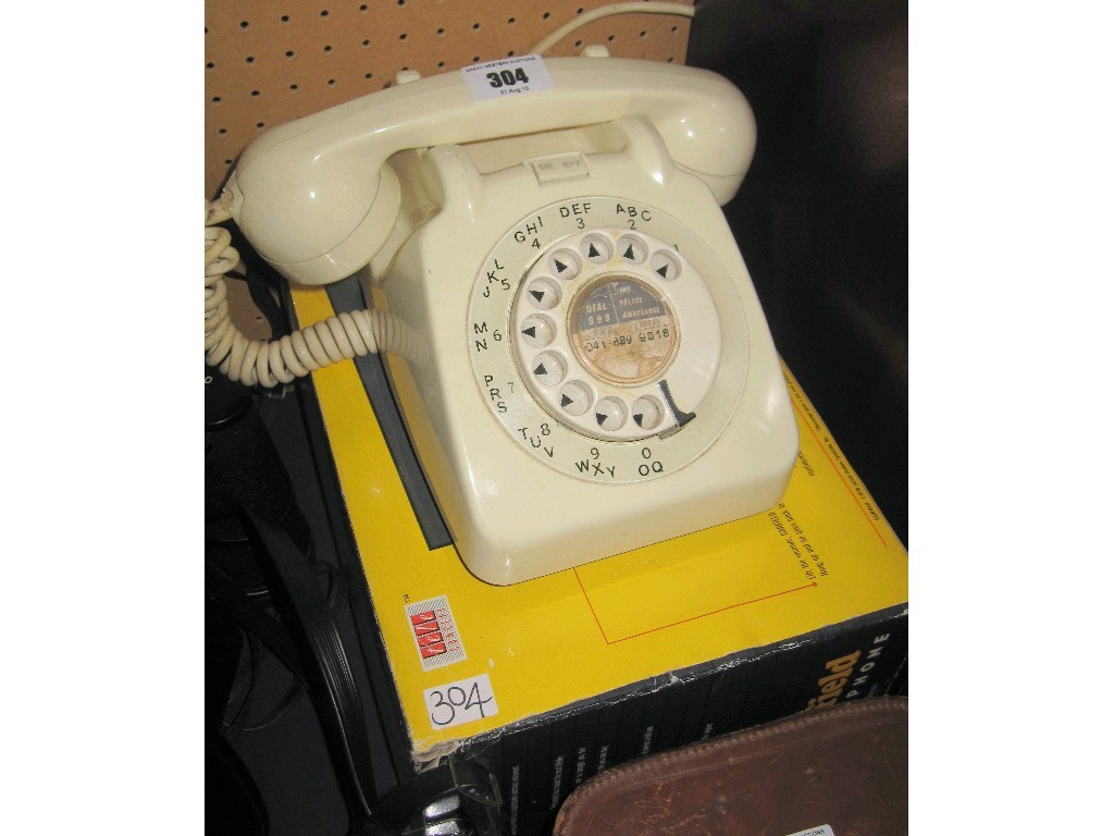 Appraisal: Lot comprising white telephone and a Garfield telephone