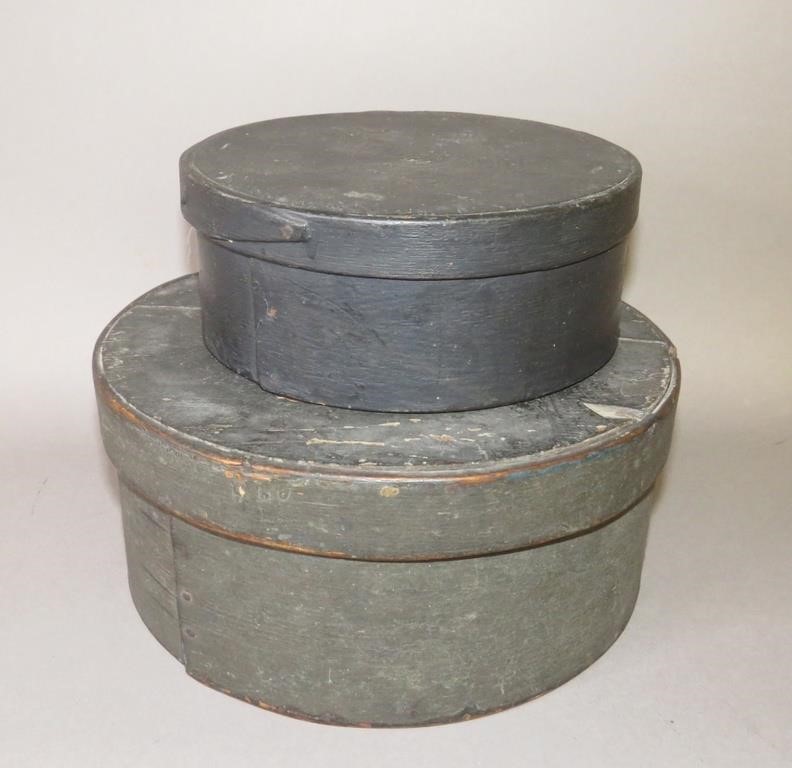 Appraisal: DARK PAINTED ROUND PANTRY BOXESca - both hardwood band boxes