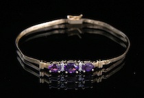 Appraisal: A Ladies' Three-Amethyst and Gold Bracelet k yellow gold bracelet