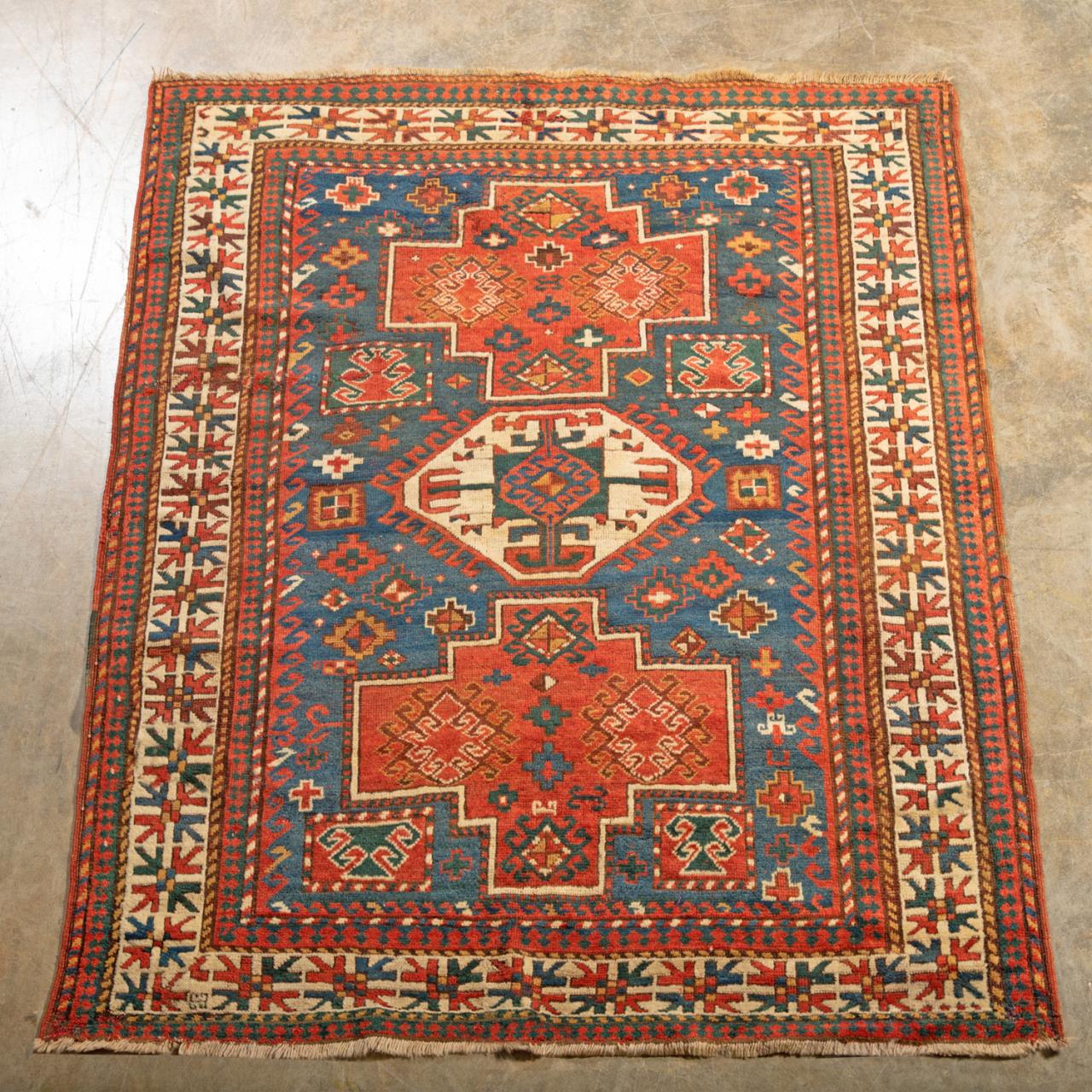 Appraisal: HAND KNOTTED WOOL ON WOOL CAUCASIAN RUG X Hand knotted