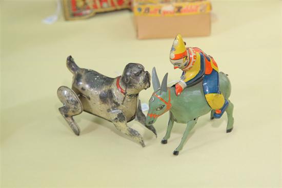 Appraisal: TWO GERMAN WIND-UP TOYS A Gunthermann's tin litho dog ''l