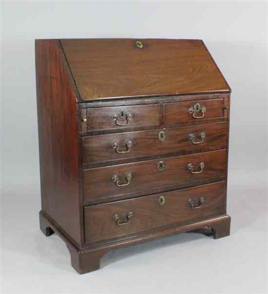 Appraisal: A George III mahogany bureau with two short and three