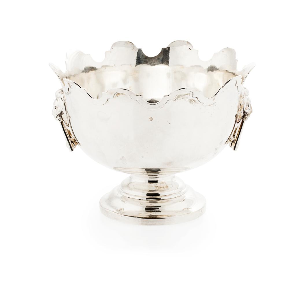 Appraisal: A silver punch bowl Walker and Hall Sheffield circa of