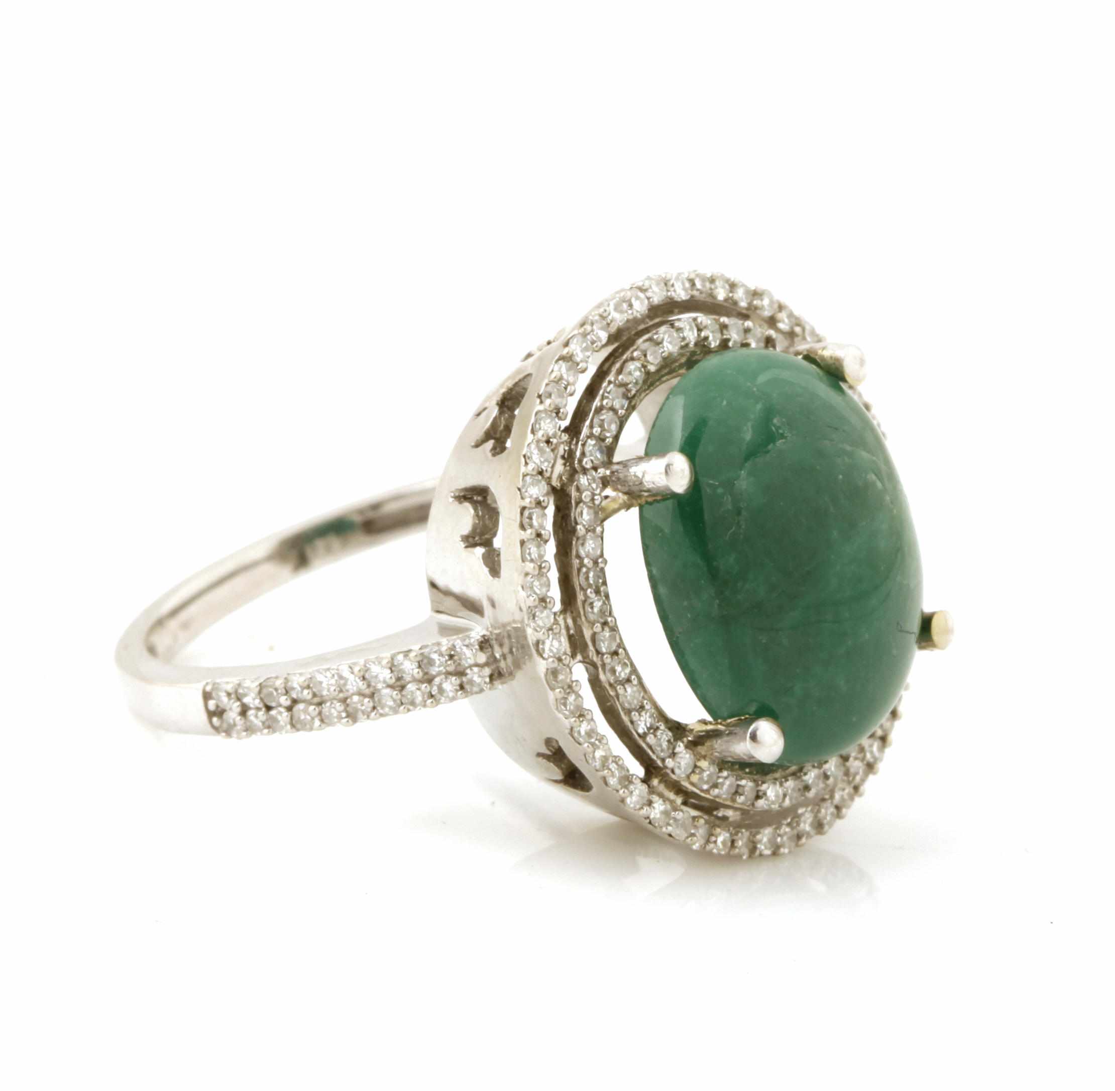 Appraisal: An emerald cabochon diamond and k white gold ring size