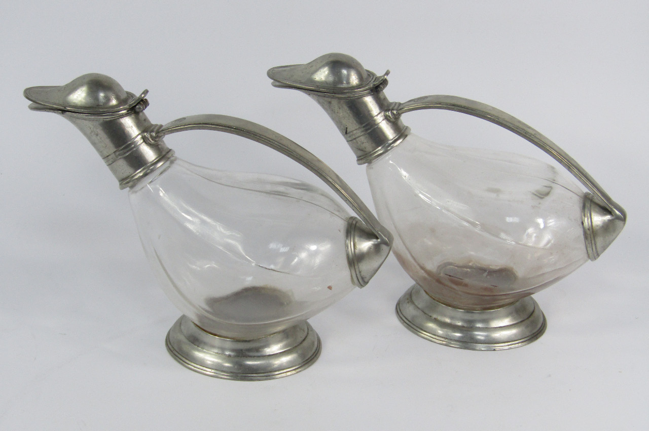 Appraisal: A pair of Continental cut glass and pewter mounted claret