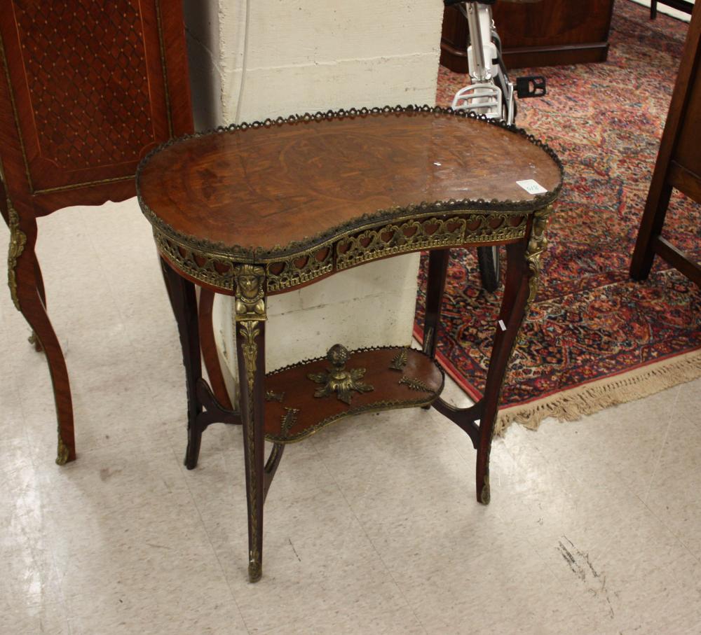 Appraisal: LOUIS XV STYLE ORMOLU-MOUNTED WRITING TABLE th century having an