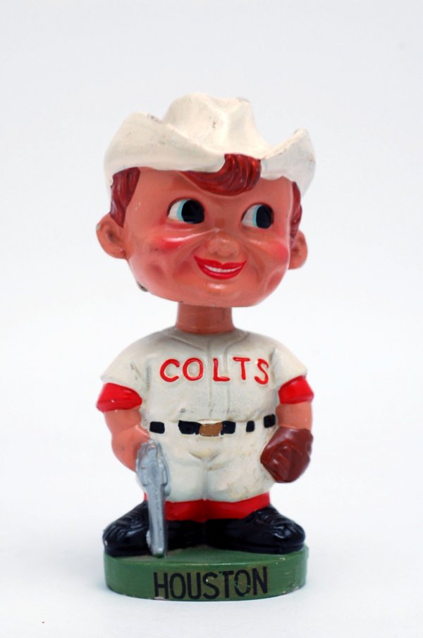 Appraisal: Circa Houston Colt 's bobblehead of a boy wearing a