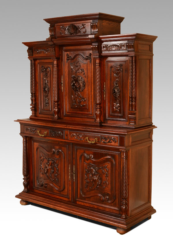 Appraisal: CARVED BLACK WALNUT STEPBACK CUPBOARD Applied carved decoration on all