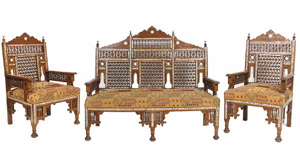 Appraisal: A five piece Moorish style suite of seat furniture comprising