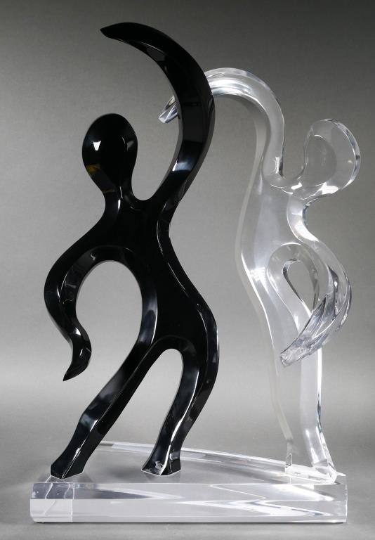 Appraisal: Unsigned MCM vintage lucite or acrylic sculpture of two figures