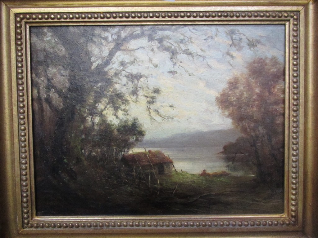 Appraisal: Oil on panel lochside scene with a figure by a