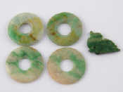 Appraisal: Four jade discs each cm diameter together with a jade