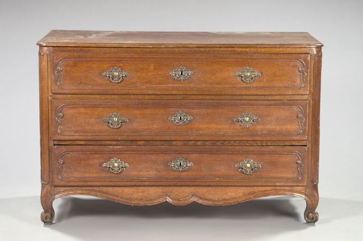 Appraisal: Provincial Louis XV-Style Oak Commode late th century the rounded