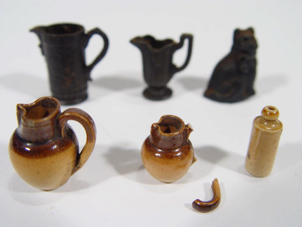 Appraisal: Six th Century miniature pottery items comprising two salt glazed