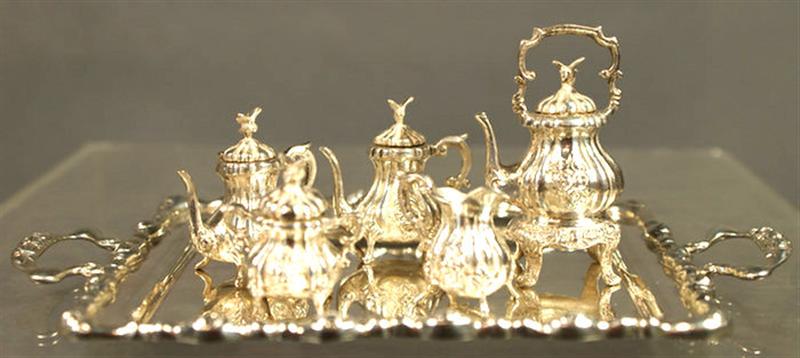 Appraisal: pc cast sterling silver miniature teaset on tray tray marked