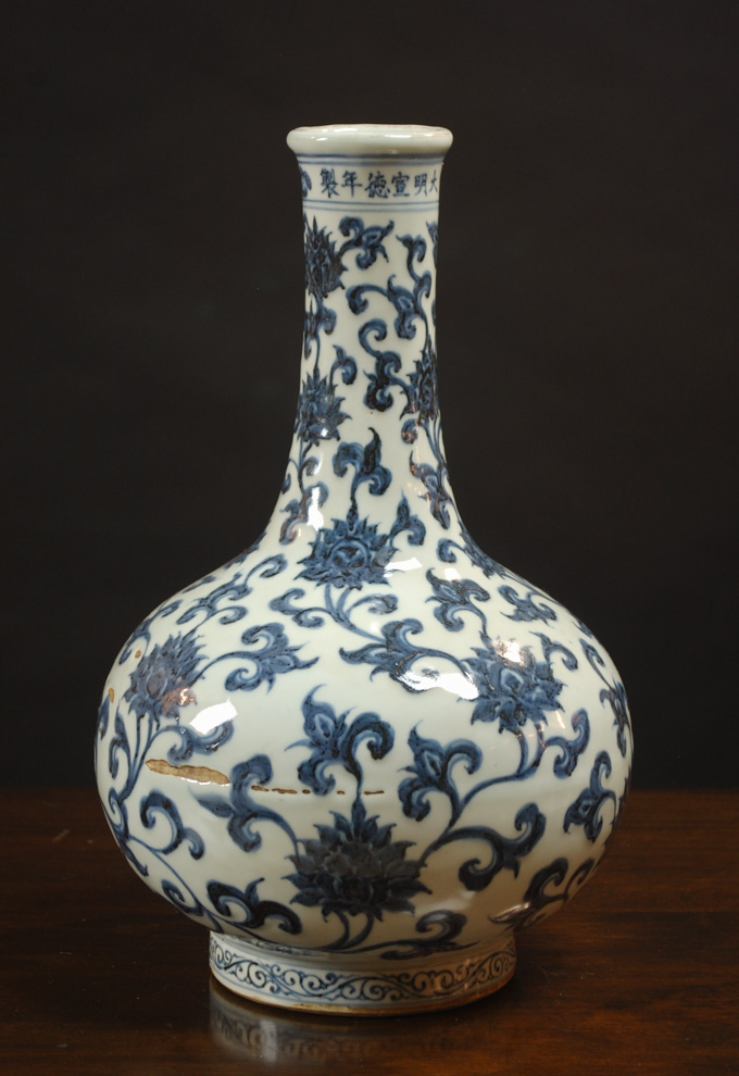 Appraisal: CHINESE MING STYLE PORCELAIN VASE of elongated bottle form and