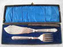 Appraisal: A boxed pair of silver plated fish servers decorated with