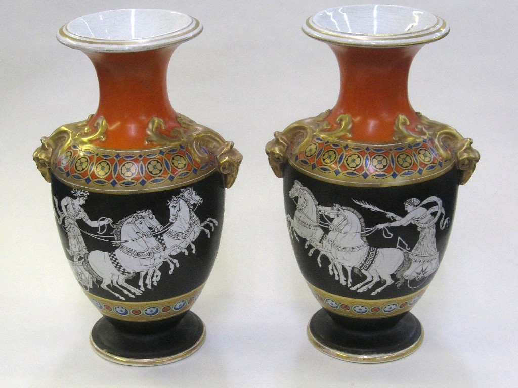 Appraisal: Pair of vases each decorated with classical scenes on a