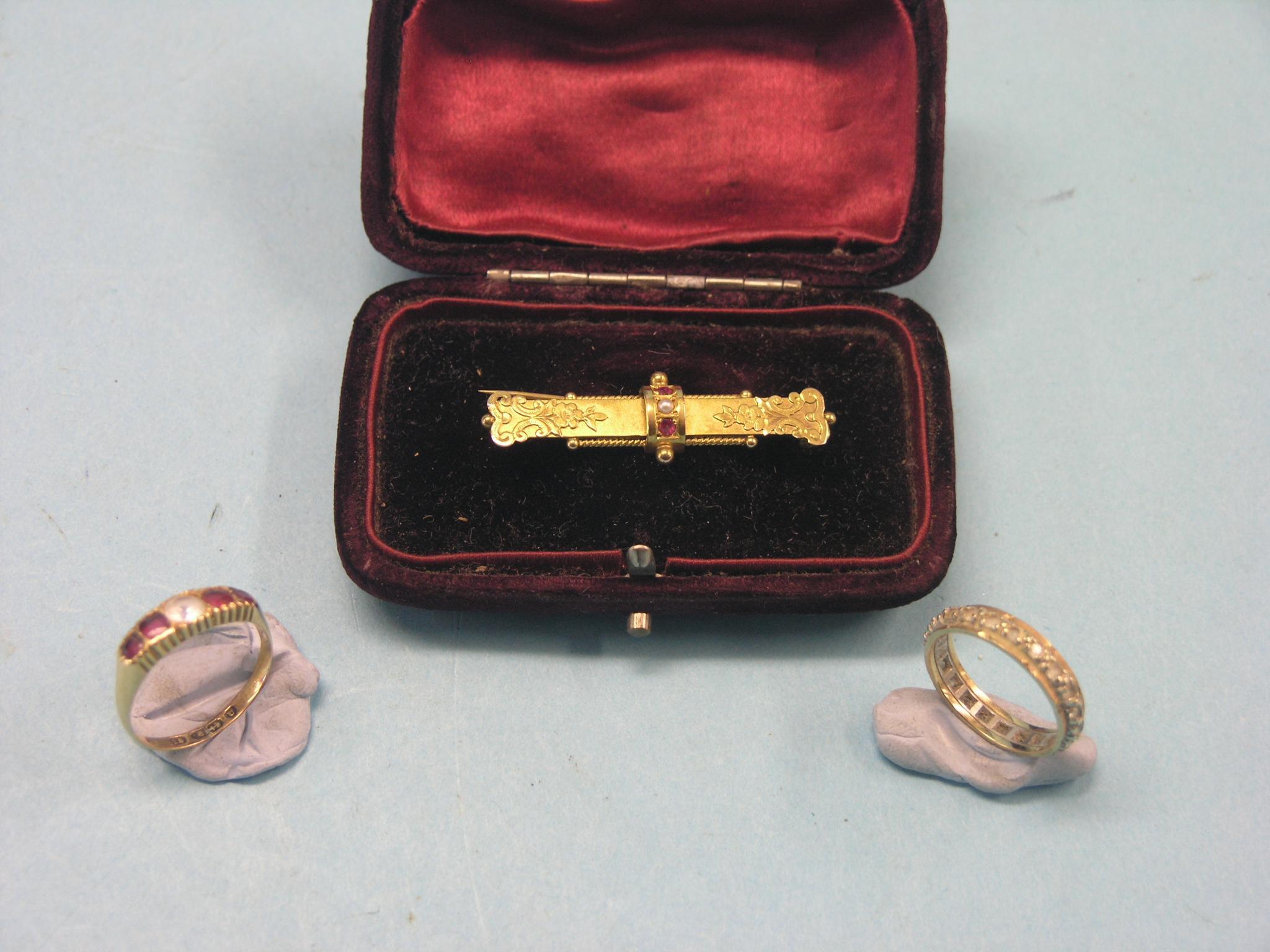 Appraisal: A Victorian engraved ct gold bar brooch set two rubies