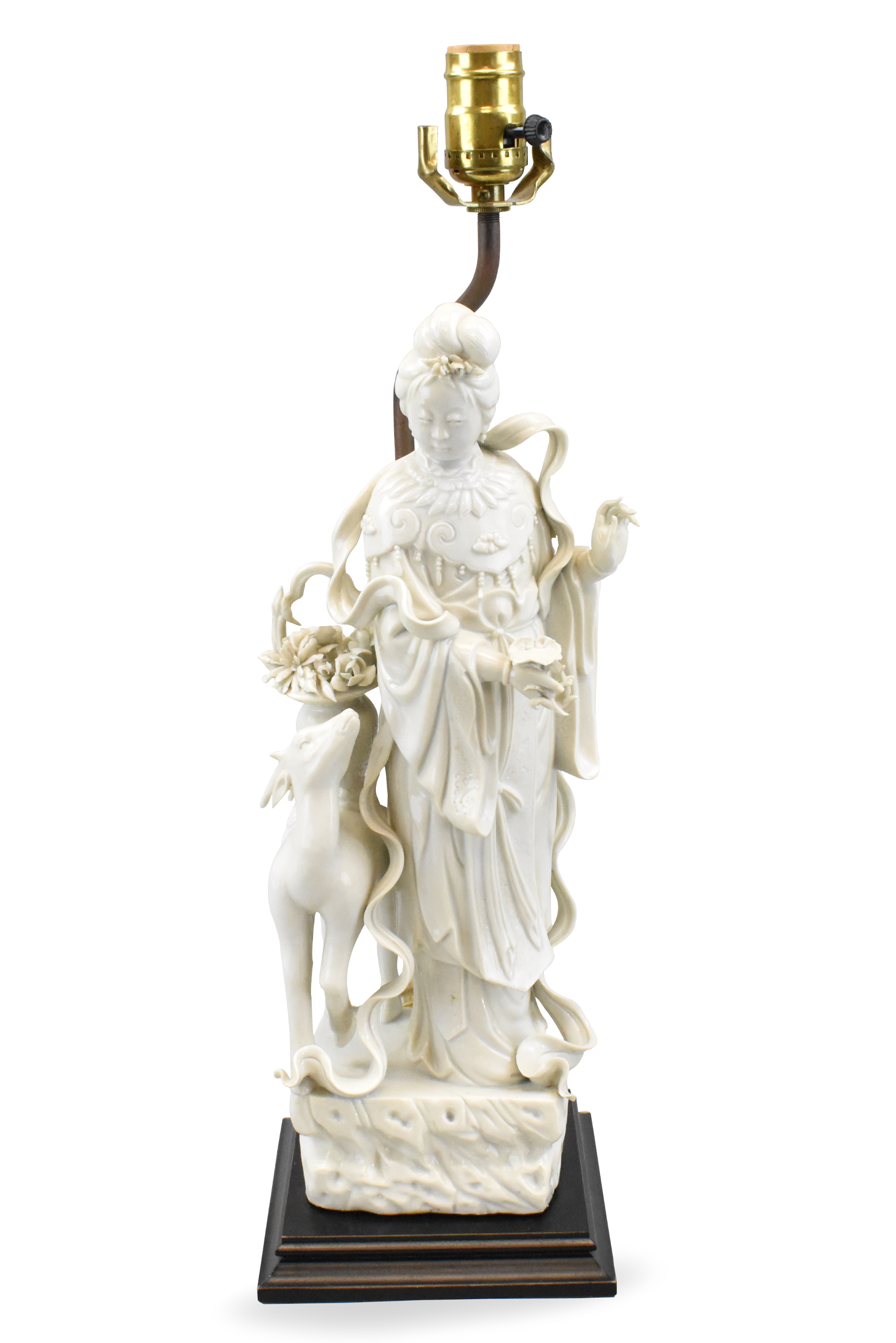 Appraisal: A Chinese dehua glazed guanyin figure with deer dating from