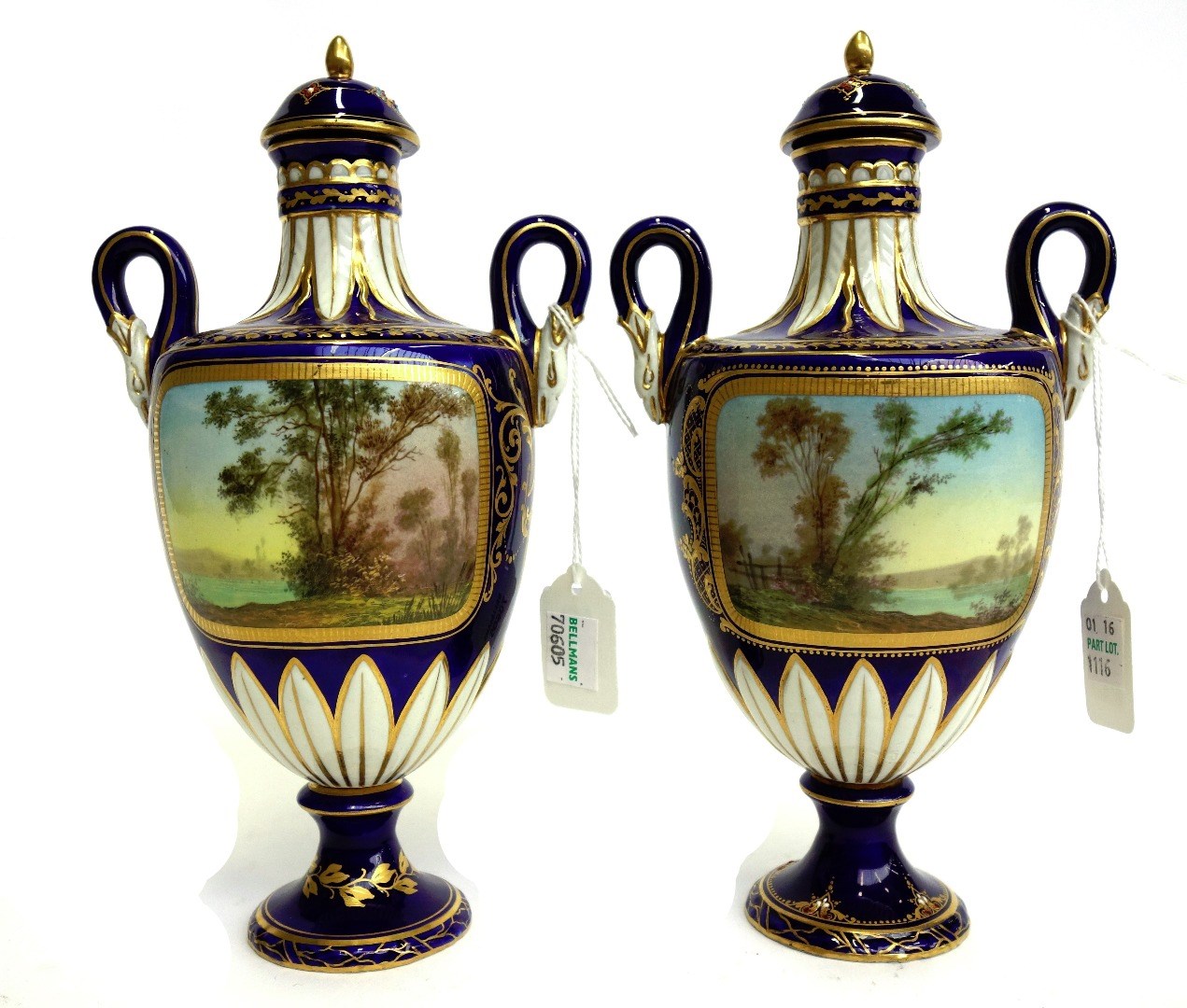 Appraisal: A matched pair of Sevres style porcelain vases and covers