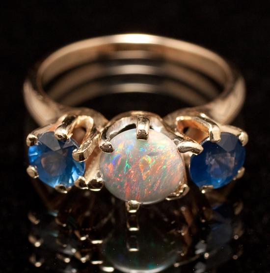 Appraisal: Lady's unmarked yellow gold blue gemstone and opal doublette ring