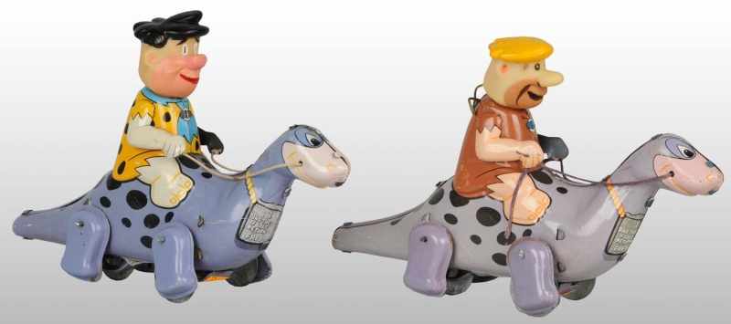 Appraisal: Lot of Tin Marx Flintstones Wind-Up Toys Description American Working