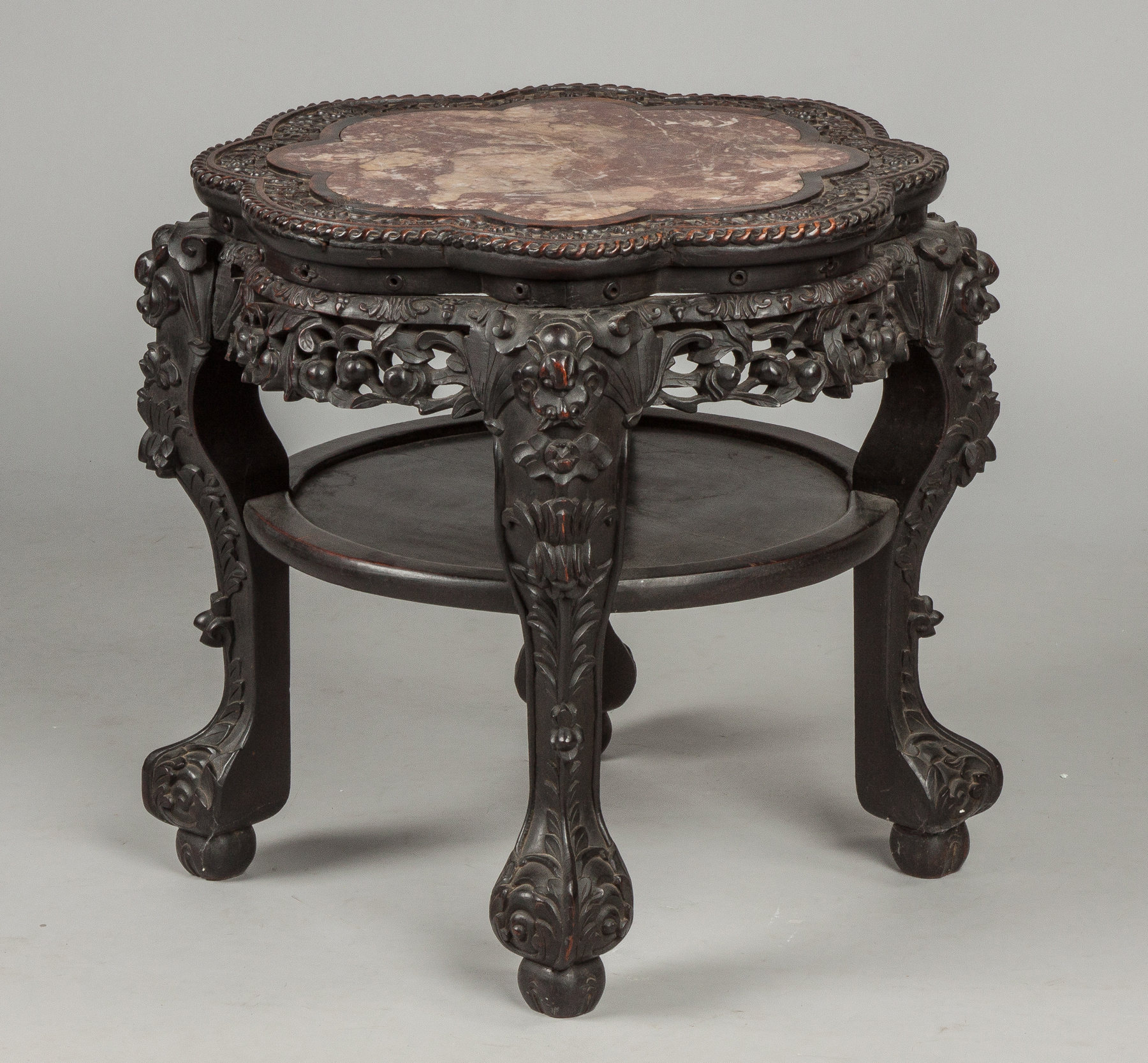 Appraisal: Chinese Export Carved Hardwood Low Table th cent Soapstone top