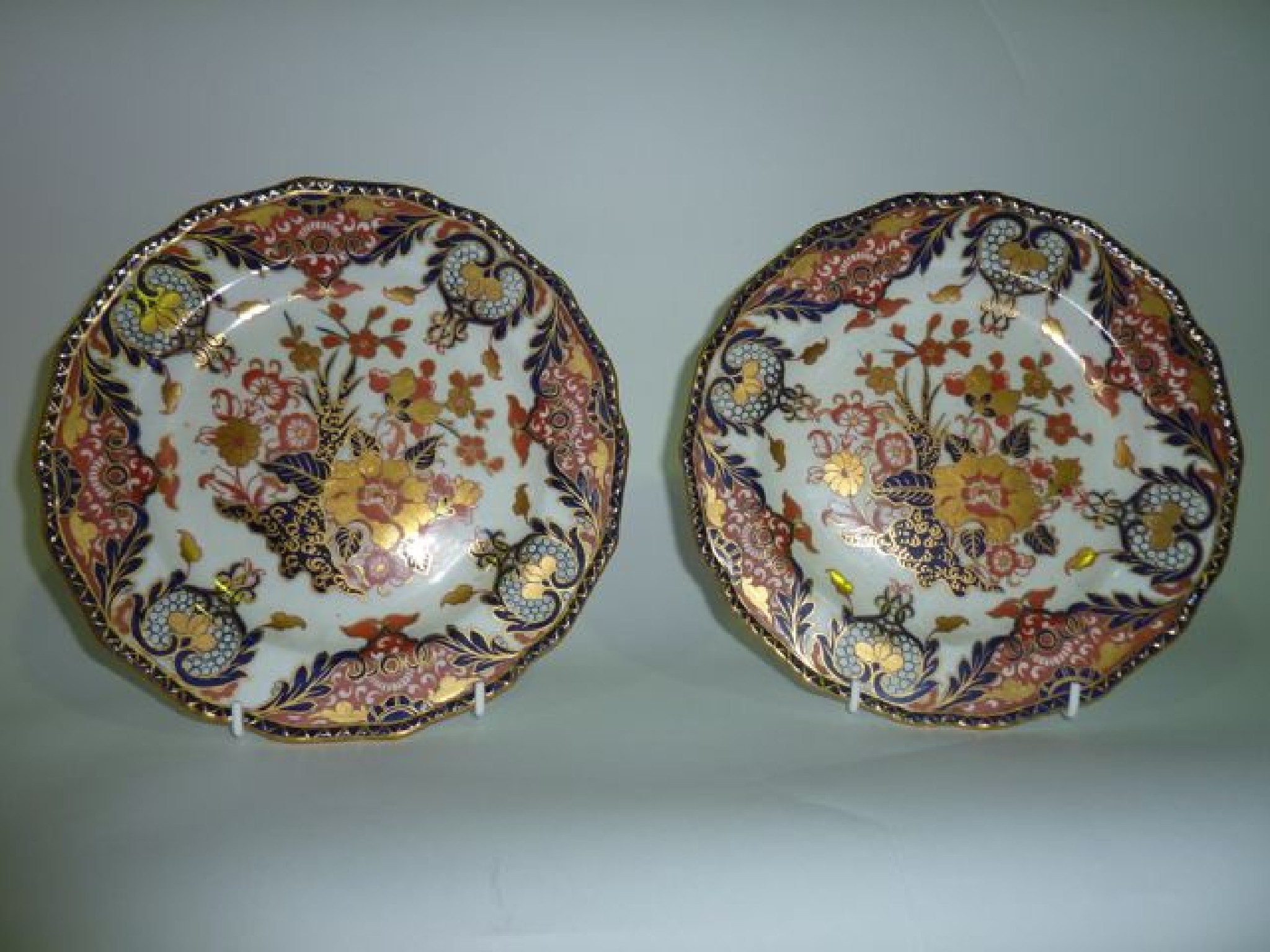 Appraisal: A pair of Royal Crown Derby cabinet plates with Imari