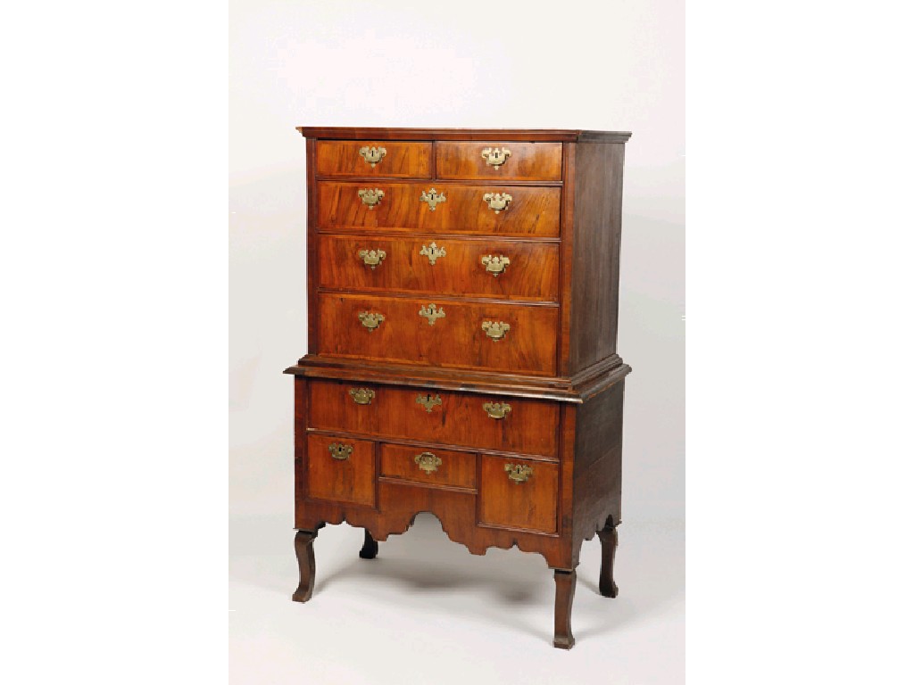 Appraisal: A GEORGE I WALNUT VENEERED CHEST ON STAND the upper