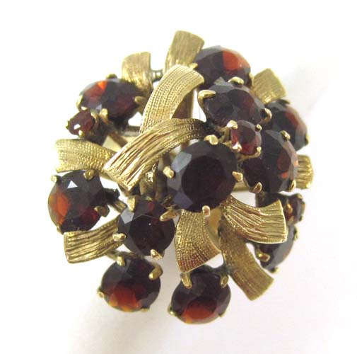 Appraisal: GARNET AND FOURTEEN KARAT GOLD RING set with round-cut garnets