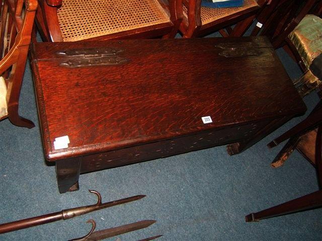 Appraisal: An th Century style oak coffer with 'H' strap hinges